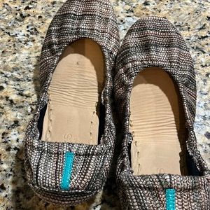 Tieks size 7 flats.  Worn one time.  They are tan and gold with some sparkle.